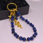 Rankų darbo rankinės ir raktų pakabukas „Nakties gyvatė“ Rankų darbo rankinės ir raktų pakabukas „Nakties gyvatė“