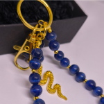 Rankų darbo rankinės ir raktų pakabukas „Nakties gyvatė“ Rankų darbo rankinės ir raktų pakabukas „Nakties gyvatė“