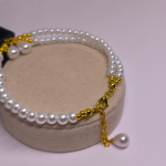 Rankų darbo apyrankė „Baltųjų perlų magija“