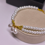 Rankų darbo apyrankė „Baltųjų perlų magija“