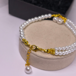 Rankų darbo apyrankė „Baltųjų perlų magija“