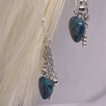 Rankų darbo auskarai „Meilės gelmė“ Rankų darbo auskarai „Meilės gelmė“