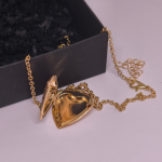 Medalionas „Auksinė širdis“