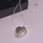 Medalionas „Tylus jausmas“